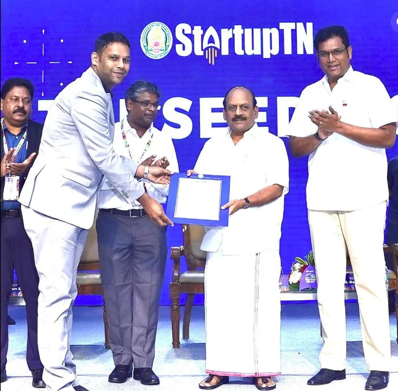 Handytamila receiving a StartupTN seed funding grant from the Government of Tamil Nadu